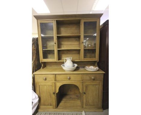 Early 20th century Pine Dresser with Open and Glazed Shelves above, over Three Drawers, Two Cupboards and a central pot shelf