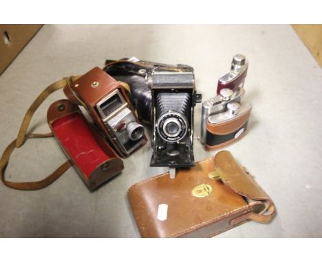 Leather Cased Bell & Howell 624 EE Cine Camera, Cased Welta Camera and Cased Binoculars plus Three Hip Flasks