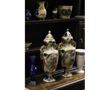 Pair of Ornate Ceramic Urns, Gouda Jug, Wedgwood Vase, Four Items on Glass, Ceramic Homepride Man, etc