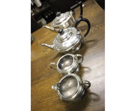 Three Piece Silver Plate Tea Service and another Teapot