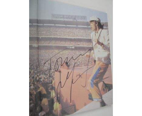 HILFIGER (Tommy) Rock Style, large folio, photo illus. contents and covers, SIGNED, New York [1999].