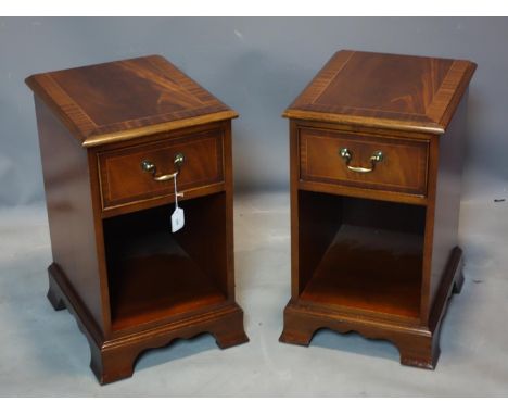 A pair of mahogany single drawer side cabinets raised on bracket feet, H.60 W.35 D.43cm 