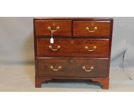 An early 19th century mahogany chest of drawers, raised on bracket feet, H.78 W.81 D.40cm 