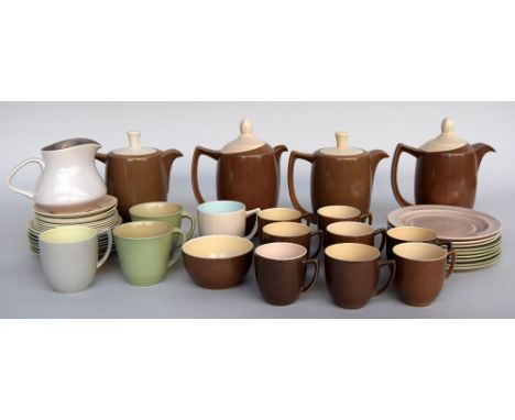A selection of Branksome pottery, including four coffee pots, nine side plates, sixteen saucers, one sugar bowl, seven coffee