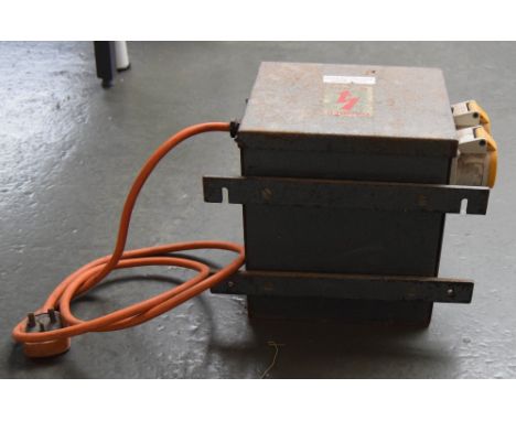 A 115 volt transformer with double outlet and halogen light on stnad