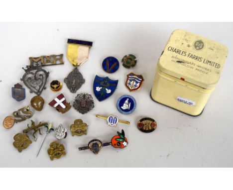 A quantity of silver and enamel early 20th century lapel badges and brooches, including a number of early Girl Guides and Boy