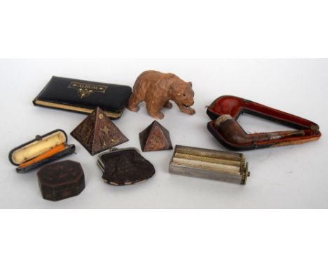 A mixed lot, including a late 19th century pipe inlaid with silver in a BBB pipe case, an amber cigarette holder inlaid with 