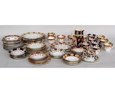 A large selection of imari style ceramic tableware consisting of cups, saucers, side plates and dinner plates from various ma