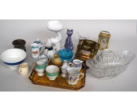 A mixed lot to include a number of small ceramic cream jugs, a carriage clock, a cut glass bowl and a soap dish, amongst othe