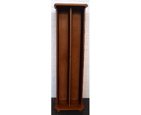 A wooden CD stand, 123cmH, together with a wooden book shelf, 152cmH