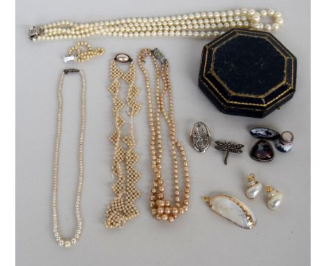 Four imitation pearl necklaces, one damaged, and one with a sterling silver clasp, together with four sterling silver brooche