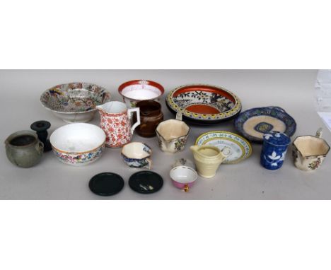 A selection of ceramic plates, jugs and bowls, including an art deco Royal Doulton 'Merryweather' teacup, two Royal Doulton '