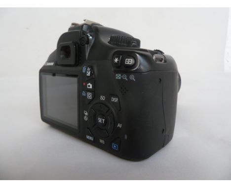 A Canon EOS 1100D digital SLR camera with Canon zoom lens ef 75-300 1:4-5.6