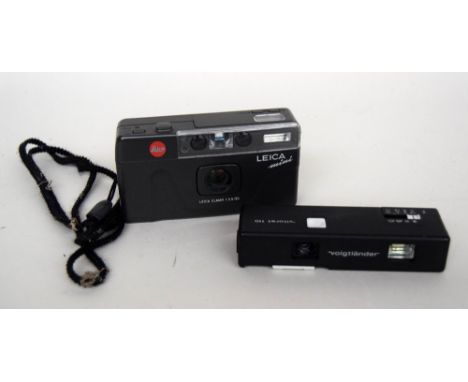 A vintage Leica Mini Elmar 1:3.5/35 camera, together with a Voigtlander Vitoret 110 Pocket-Camera-Set