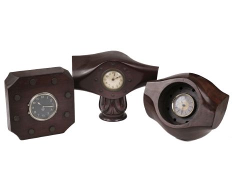 * Propeller Clocks. WWI aircraft propeller clock, circa 1915, adapted from a two-blade laminated mahogany propeller, the rear