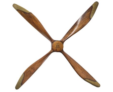 * Propeller. WWI F.E.8 four-blade mahogany propeller, circa 1916, the laminated blades with brass sheathed tips, the boss sta