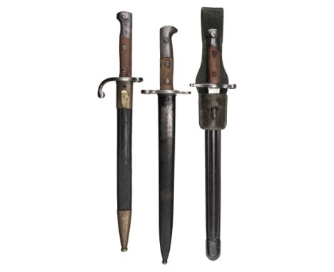 * Swiss bayonet, M1918-55, the 29.5 cm steel blade stamped Waffenfabrik Neuhausen, the crossguard stamped 524836, wooden grip