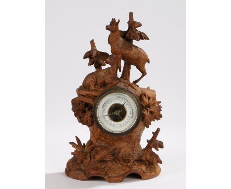 German black forest barometer, the carved case with depiction of two chamois amongst trees, 28cm highBack chamois with missin