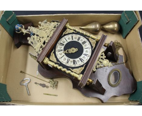 Mahogany wall clock, the shaped pediment with gilt figure depicting Atlas above a pierced brass frieze and dial with Roman nu