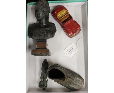 Works of art to include cast metal shoe, door knocker, bust, Arcor toy car (4)