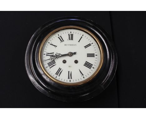 Ebonised dial clock, the white dial with name "Hennequin EU", 37.5cm diameter