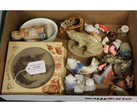 Collection of porcelain figures, to include two 'Poole for Collectors' plaques, animal-shaped figures, a porcelain boot, and 