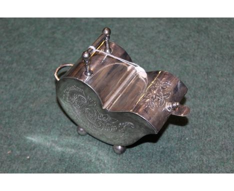 Silver plated spoon warmer/ tea caddy, in the form of a coal purdonium with engraved scroll decoration, together with a plate