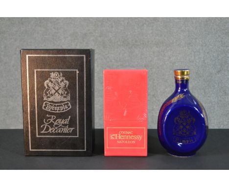 A collection of boxed whisky and Cognac, including a boxed Royal Pewter decanter of Dimple 12 year Scotch Whisky, a boxed bot