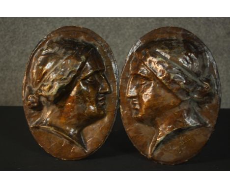 Two 19th century papier mache classical style bust relief wall plaques. H.21 W.23cm each. 