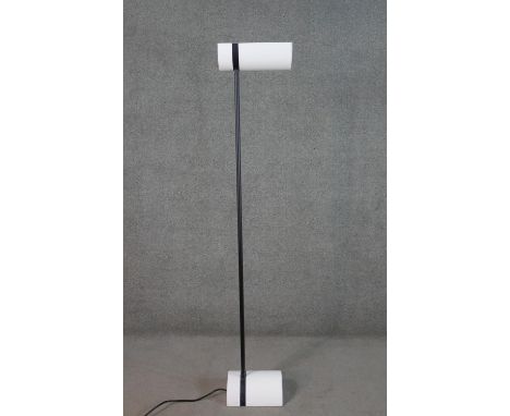 Thorn Lighting, Germany, a circa 1980s EMI uplighter lamp, with a white half cylinder shade and base, joined by black tubular