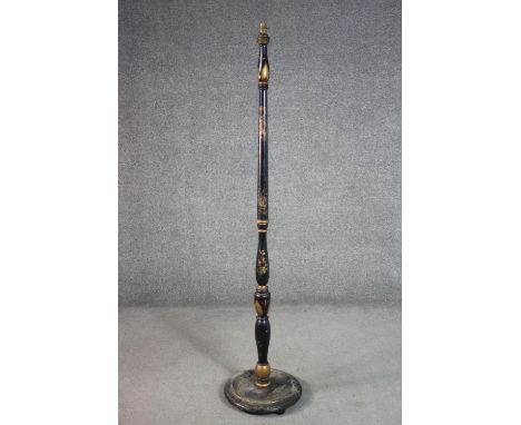 A circa 1920s Chinoiserie standard lamp, black lacquered and parcel gilt, with a turned stem on a circular base. H.160cm. 