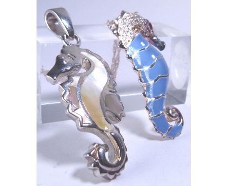 SILVER PENDANTS. Two silver and mother of pearl seahorse pendants and a silver chain 