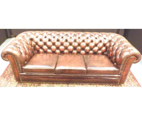 LEATHER CHESTERFIELD. Large red leather three seater button back chesterfield L:222 cm