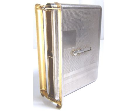 CIGARETTE HOLDER. Engine turned cigarette holder and dispenser 