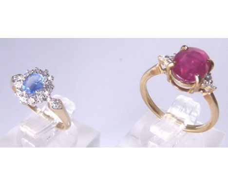 DIAMOND RINGS. 9ct Ruby and Diamond set ring size K 2.3g and a Sapphire and Diamond 9ct gold ring 1.8g 