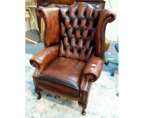 LEATHER CHAIR. Red leather button back wingback armchair