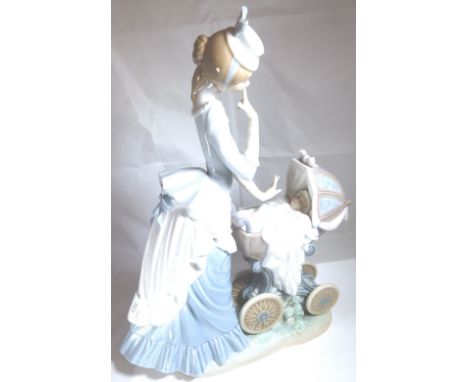 LARGE LLADRO FIGURINE. Lladro lady with pram, H - 30cm CONDITION REPORT: At lotting the item appears undamaged and complete a