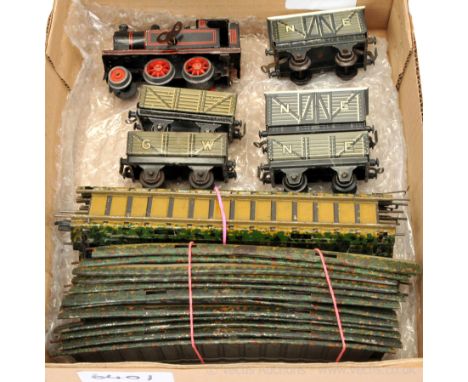 Bing Table Top Railway, clockwork black Tank Engine with a mix of NE / GW Wagons, in Good condition however the loco has a lo