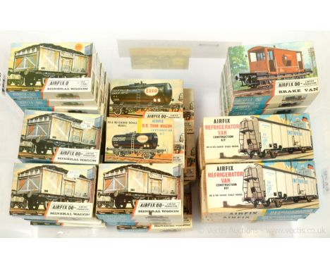 Airfix OO Gauge a group of Wagon Kits consisting of Refrigerator Van, Interfrigo, Mineral Wagon, Esso Tanker and Brake Van al