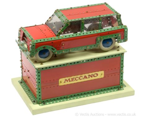 Meccano Binns Road factory built light red and green shop window display model of an Estate type Car on a grey base, the mode
