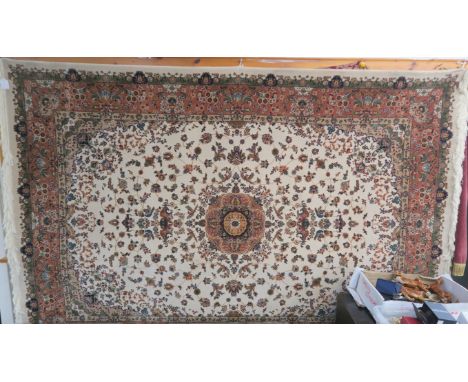 A modern light ground Eastern style rug with central medallion with birds and foliate design, 150cm x 220cm Condition Report: