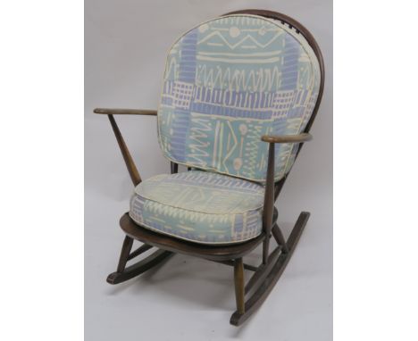 An Ercol rocking chair with cushions Condition Report: Available upon request