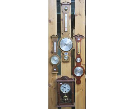 Three barometers and a mantle clock (4) Condition Report: Available upon request