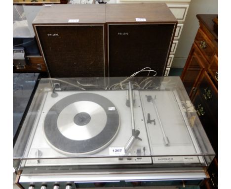 A Philips 814 stereo record player and tuner with a pair of Philips 22 RH 412 51Z 4 ohm speakers (af) Condition Report: Avail