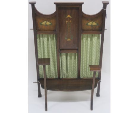 A stained Art Nouveau fire screen with painted motifs, 91cm high Condition Report:&nbsp;Front left support appears to have be