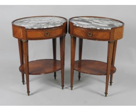 A pair of 19th century French Kingwood and tulipwood crossbanded oval single drawer tables with white and grey veined inset t