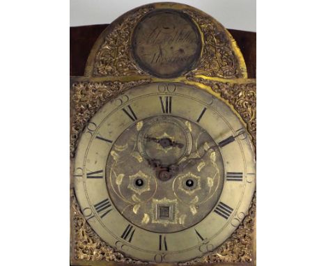 A George III oak eight day longcase clock, the 12 inch arched brass dial with centred subsidiary seconds dial and date apertu