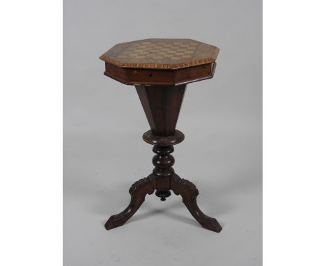 A Victorian walnut chequer board topped octagonal pedestal work table on tripod base, 44cm diameter, 74cm high
