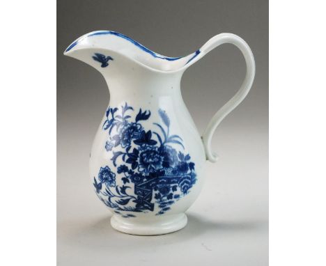 A Worcester blue and white porcelain helmet-shaped jug, circa 1775, transfer-printed in underglaze blue with the 'Fence' patt