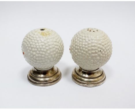 A pair of silver mounted ceramic golf ball salt and pepper shakers, Chester (2)

Provenance: Bowdon Old Hall, Cheshire